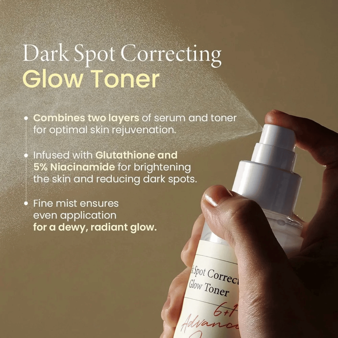 Hand spraying dark spot correcting glow toner with fine mist for radiant skin glow